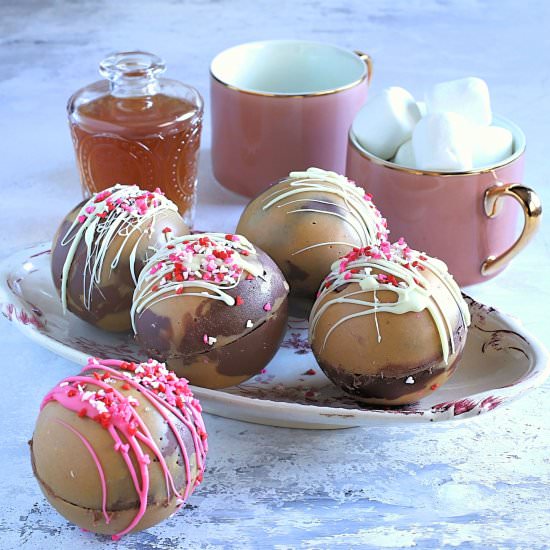Boozy PB Chocolate Hot Cocoa Bombs - Recipe photo by Hungry Couple