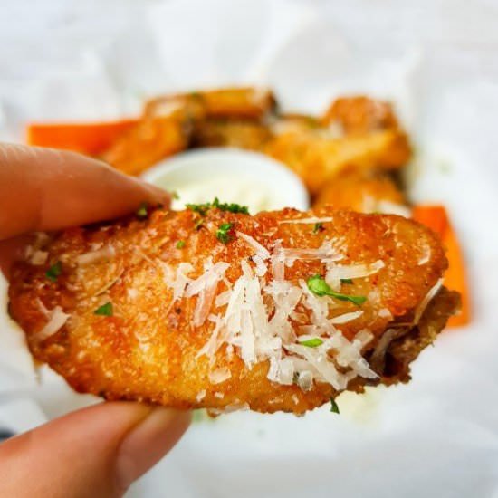Baked Garlic Parmesan Chicken Wings - Recipe photo by noshingwiththenolands