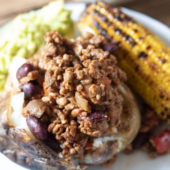Jacket potato with mushroom chilli - Recipe photo by Mandy Sneaky Veg