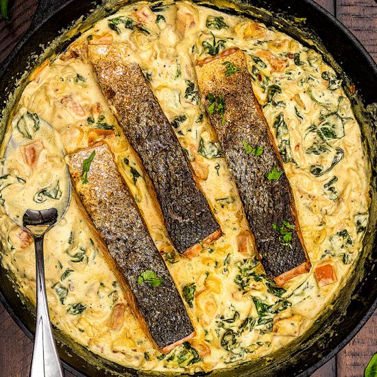 Salmon in Creamy Curried Spinach - Recipe photo by clove and cumin