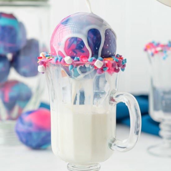 Galaxy Hot Chocolate Bombs - Recipe photo by noshingwiththenolands