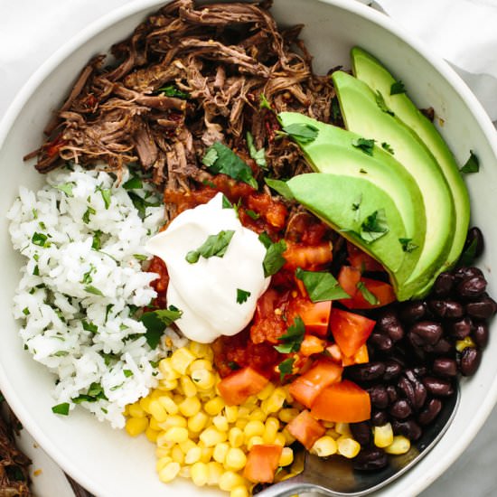 Barbacoa Burrito Bowl - Recipe photo by Downshiftology