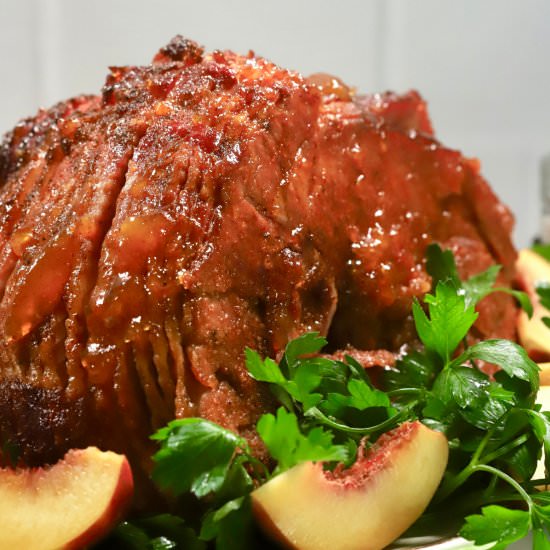 Smoked Ham with Spicy Peach Glaze - Recipe photo by Grits and Pinecones