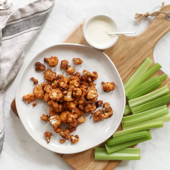 air fryer buffalo cauliflower - Recipe photo by The Merrythought