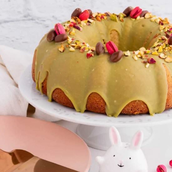 Glazed Pistachio Bundt Cake - Recipe photo by noshingwiththenolands
