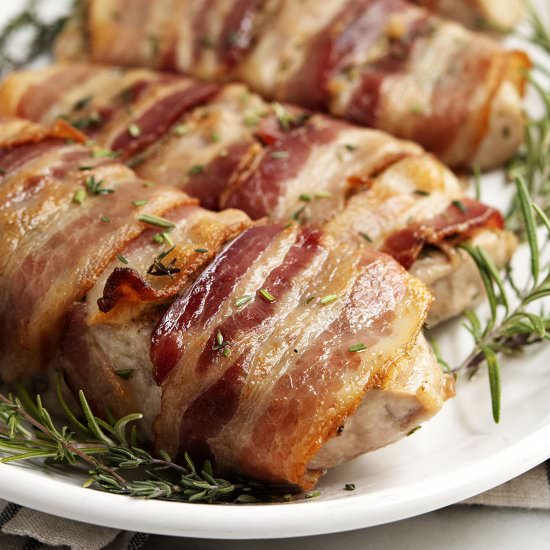 Bacon Wrapped Pork Chops - Recipe photo by PinchandSwirl