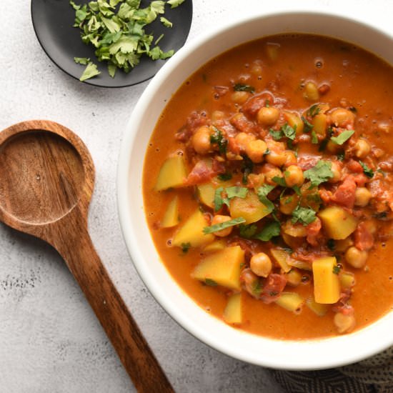 Creamy Tomato Vegan Curry - Recipe photo by TheHomeBakedVegan