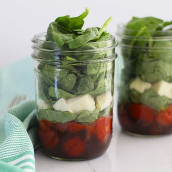 Tomato Caprese Mason Jar Salad - Recipe photo by FitLiving Eats