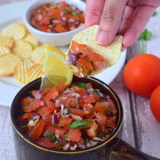 Fresh tomato salsa - Recipe photo by rumkisgoldenspoon
