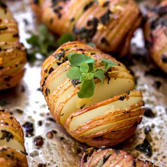 Sage & Garlic Hasselback Potatoes - Recipe photo by vancouverwithlove