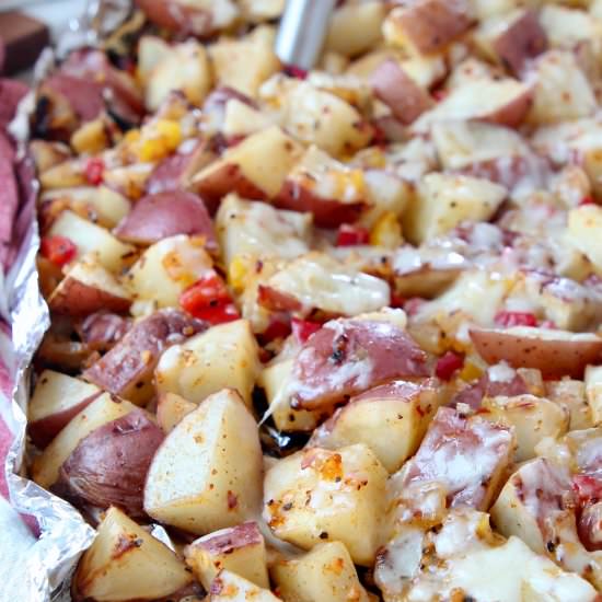 Cheesy Grilled Potatoes - Recipe photo by Whitney Bond