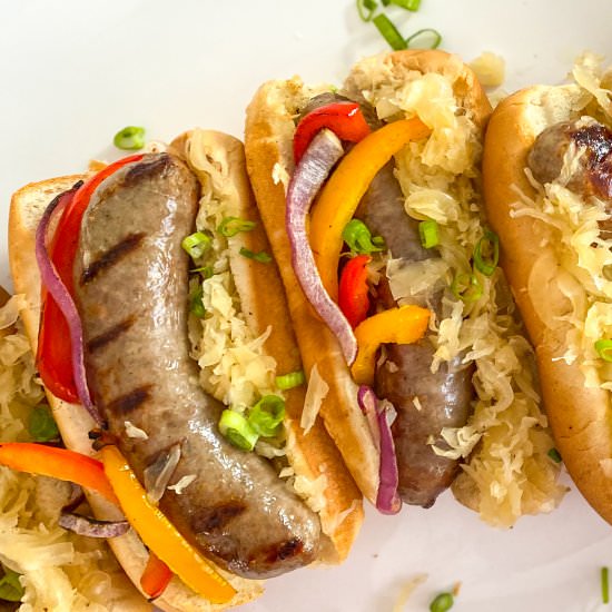 Grilled Brats w/ IPA Sauerkraut - Recipe photo by Nictastingspoon