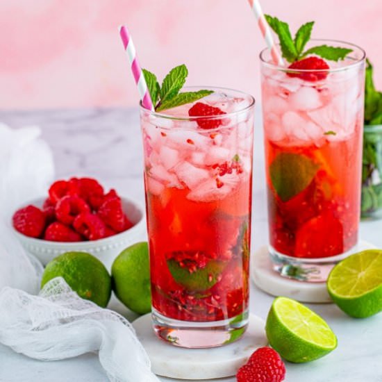 Fresh Raspberry Mojitos - Recipe photo by noshingwiththenolands