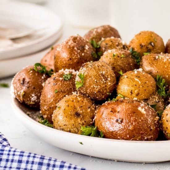Garlic Herb Smoked Potatoes - Recipe photo by noshingwiththenolands