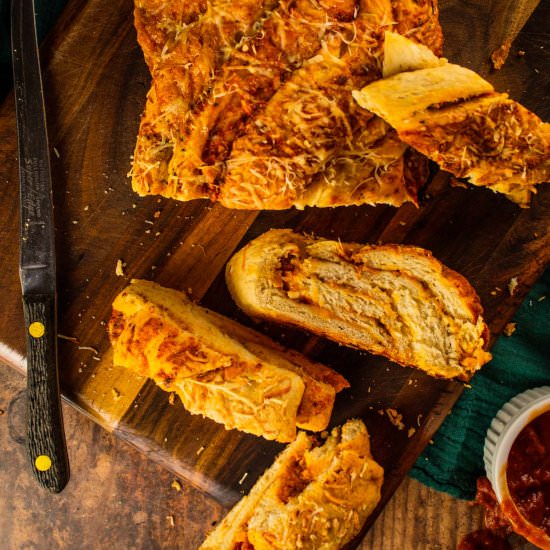 Cheesy Braided PIzza Bread - Recipe photo by SaporitoKitchen