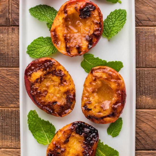 Maple Bourbon Grilled Peaches - Recipe photo by BBQing With The Nolands