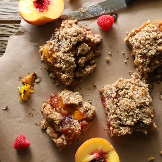 Raspberry Peach Crumb Bars - Recipe photo by butternutandsage