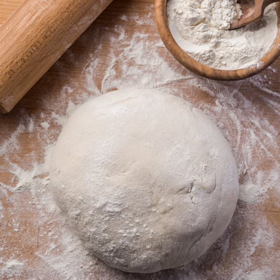 Easy Thin Crust Pizza Dough - Recipe photo by baking4happiness