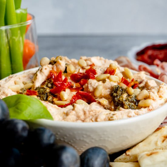 Genovese Goat Cheese & Pesto Dip - Recipe photo by TheDeliciousSpoon