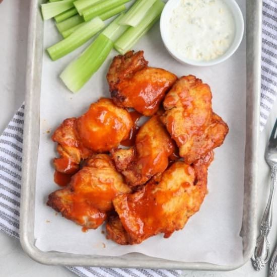 Buffalo Chicken Thighs - Recipe photo by whollytasteful
