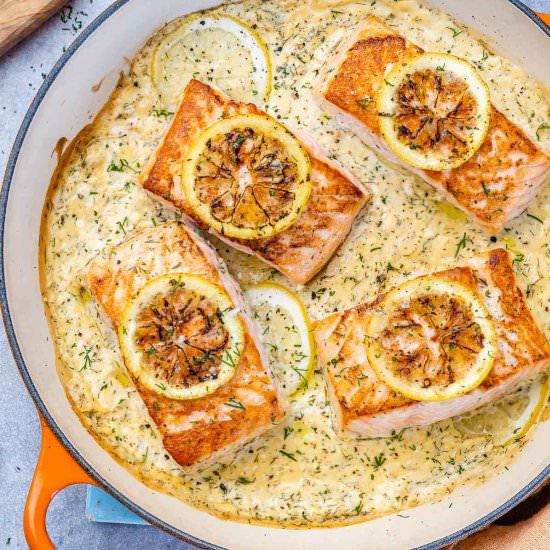 PAN-SEARED SALMON IN CREAMY LEMON S - Recipe photo by healthyfitnessmeals