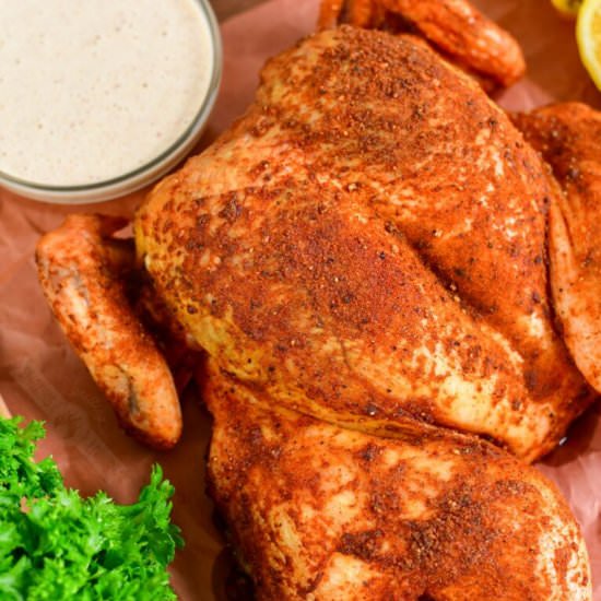 SMOKED SPATCHCOCK CHICKEN - Recipe photo by GrillingSmokingLiving
