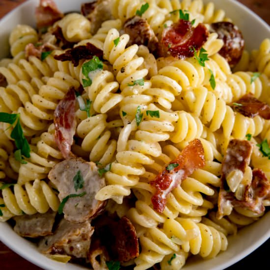 Creamy Sausage Pasta with Bacon - Recipe photo by KitchenSanctuary