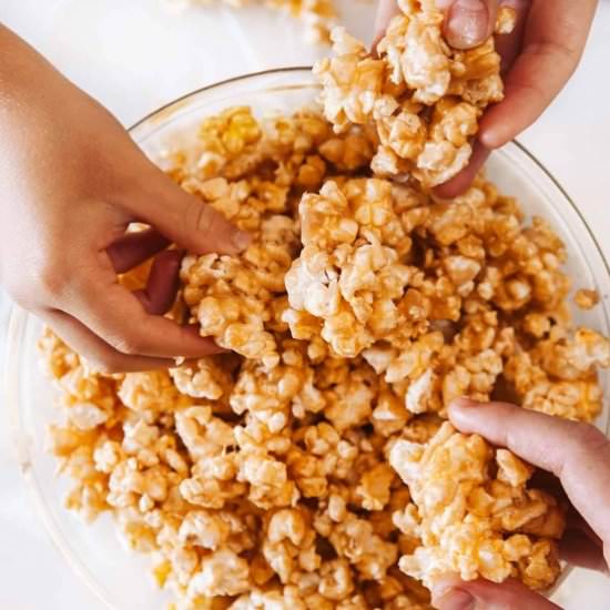 Peanut Butter Popcorn - Recipe photo by noshingwiththenolands