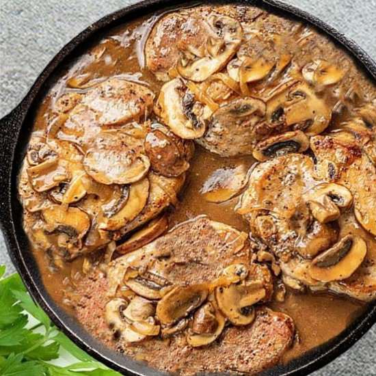 Smothered Pork Chops WIth Gravy - Recipe photo by debzrecipes