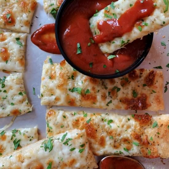 Cheesy Garlic Breadsticks - Recipe photo by agoudalife