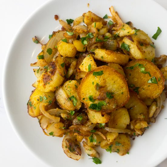 Fried Potatoes and Onions - Recipe photo by bitesofberi