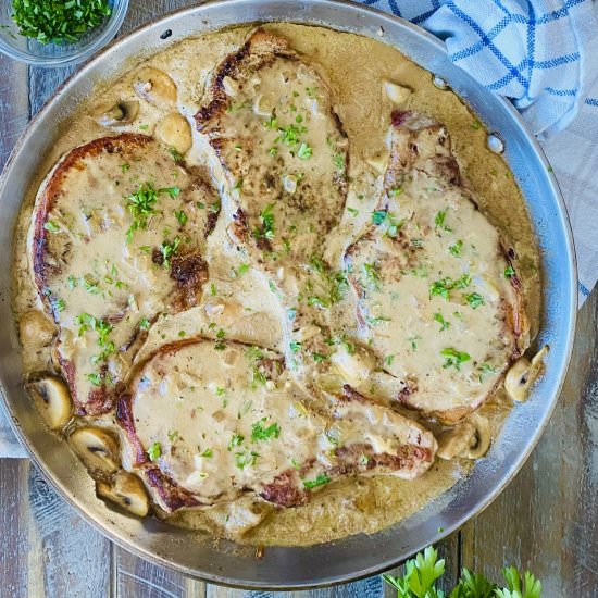 Smothered Pork Chops with Mushrooms - Recipe photo by amycaseycooks