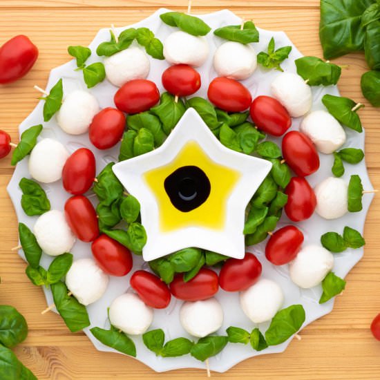 Caprese Appetizer Holiday Wreath - Recipe photo by dishnthekitchen