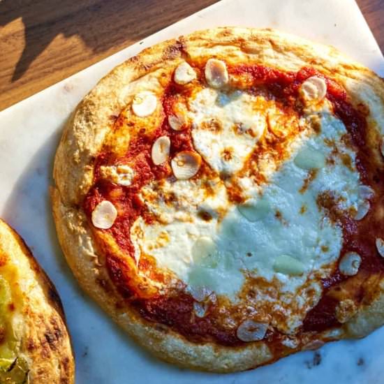 Marinara, Garlic, and Burrata Pizza - Recipe photo by proportionalplate