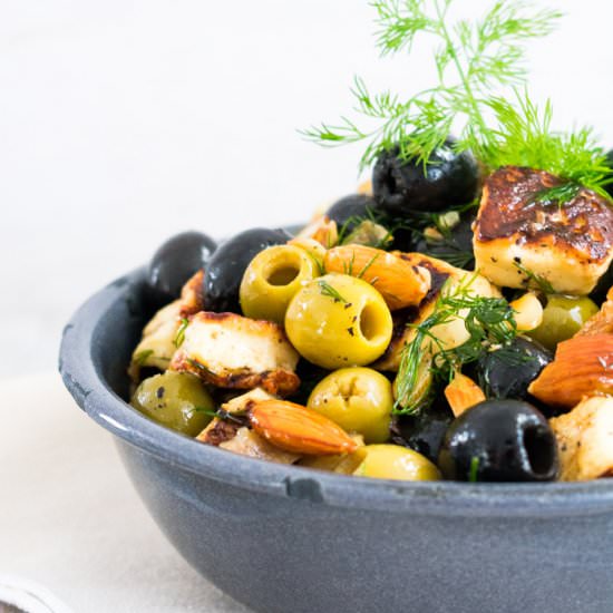 Marinated cheese and almond olives - Recipe photo by petitedecadence