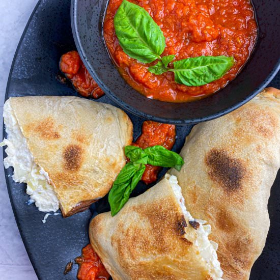 Easy Homemade Calzones - Recipe photo by TastefullyGrace