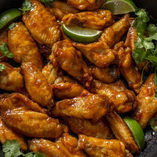 Baked Honey Sriracha Wings - Recipe photo by This Home Kitchen