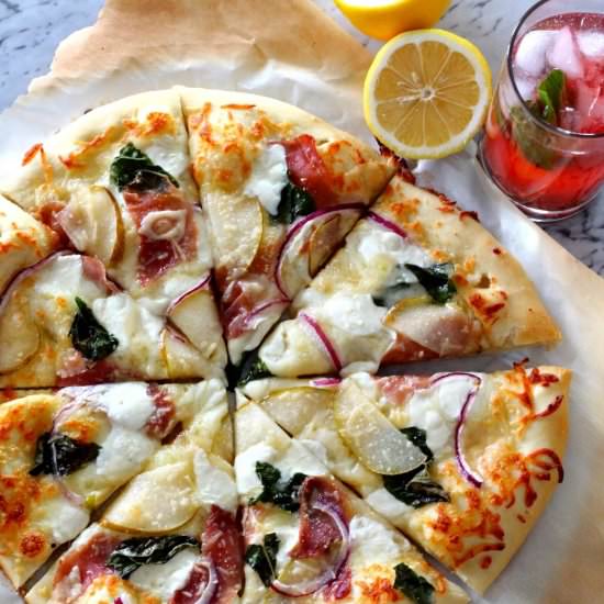 Pizza with Prosciutto + Pistachios - Recipe photo by ThymefortheTable