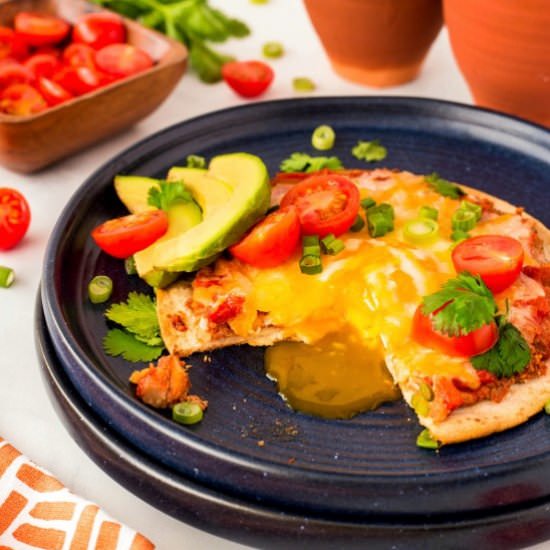 Sheet Pan Huevos Rancheros - Recipe photo by noshingwiththenolands