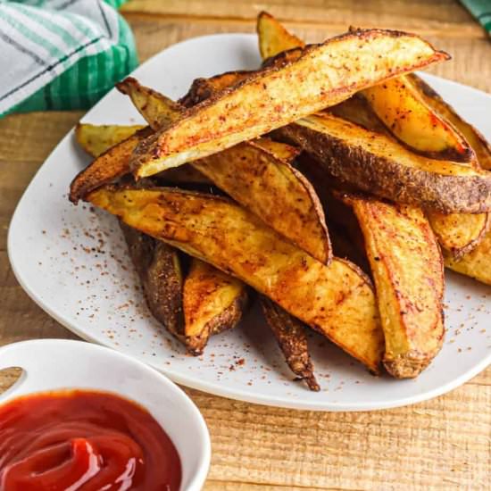Golden Crispy Baked Potato Wedges - Recipe photo by OnMyKidsPlate