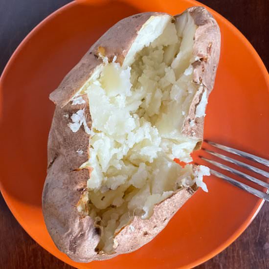 How to Bake a Potato - Recipe photo by Caramelized Chaos
