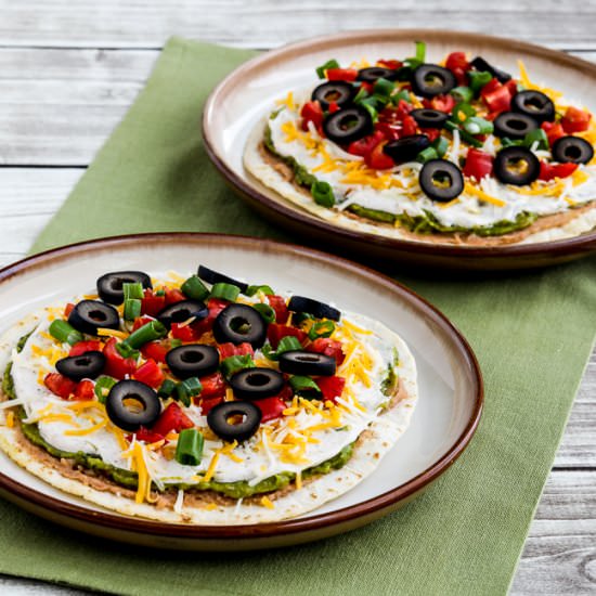 Seven Layer Dip Tostadas - Recipe photo by kalynskitchen