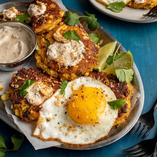 Kefir corn cakes with fried eggs - Recipe photo by cherryonmysundae