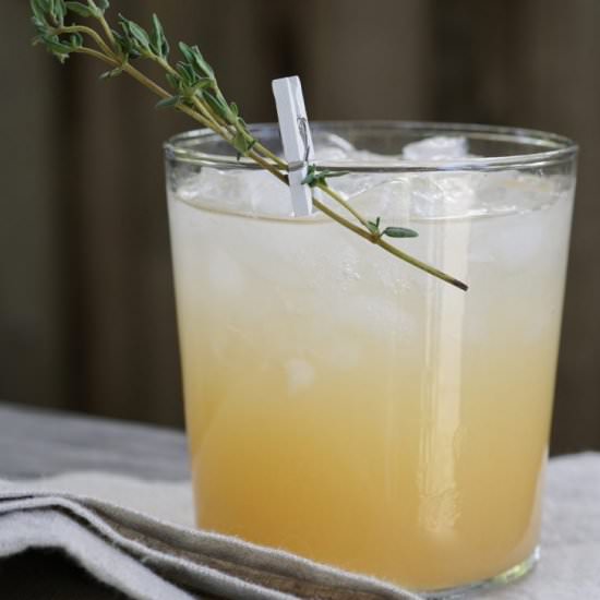 Grapefruit-Thyme Soda Mocktail - Recipe photo by simmerandsauce
