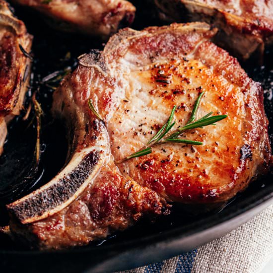 Cast Iron Pork Chops - Recipe photo by PinchandSwirl