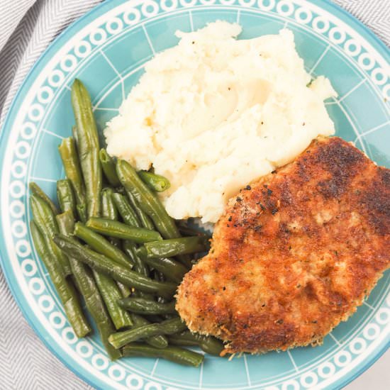 Blackstone Parmesan Pork Chops - Recipe photo by OleBlueDog
