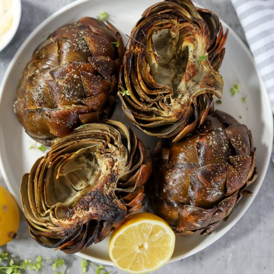 Roasted Artichokes with Lemon - Recipe photo by Man Meets Oven
