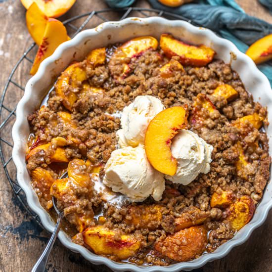 Peach Crumble - Recipe photo by BritneyBreaksBread