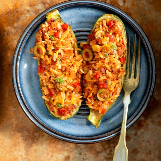 Chorizo and rice stuffed zucchini - Recipe photo by TiaClara