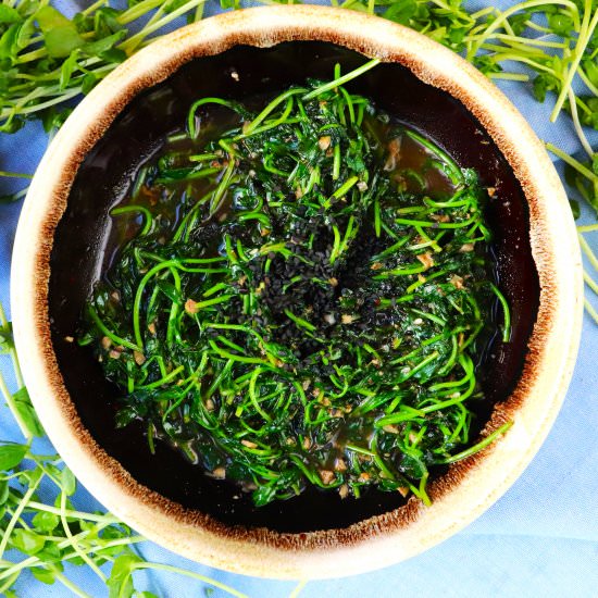 SAUTEED ZA’ATAR PEA SHOOTS - Recipe photo by veryveganval